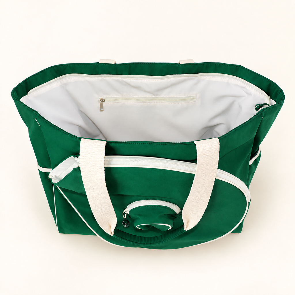Open green Tennisea Court Tote showing the white-lined interior